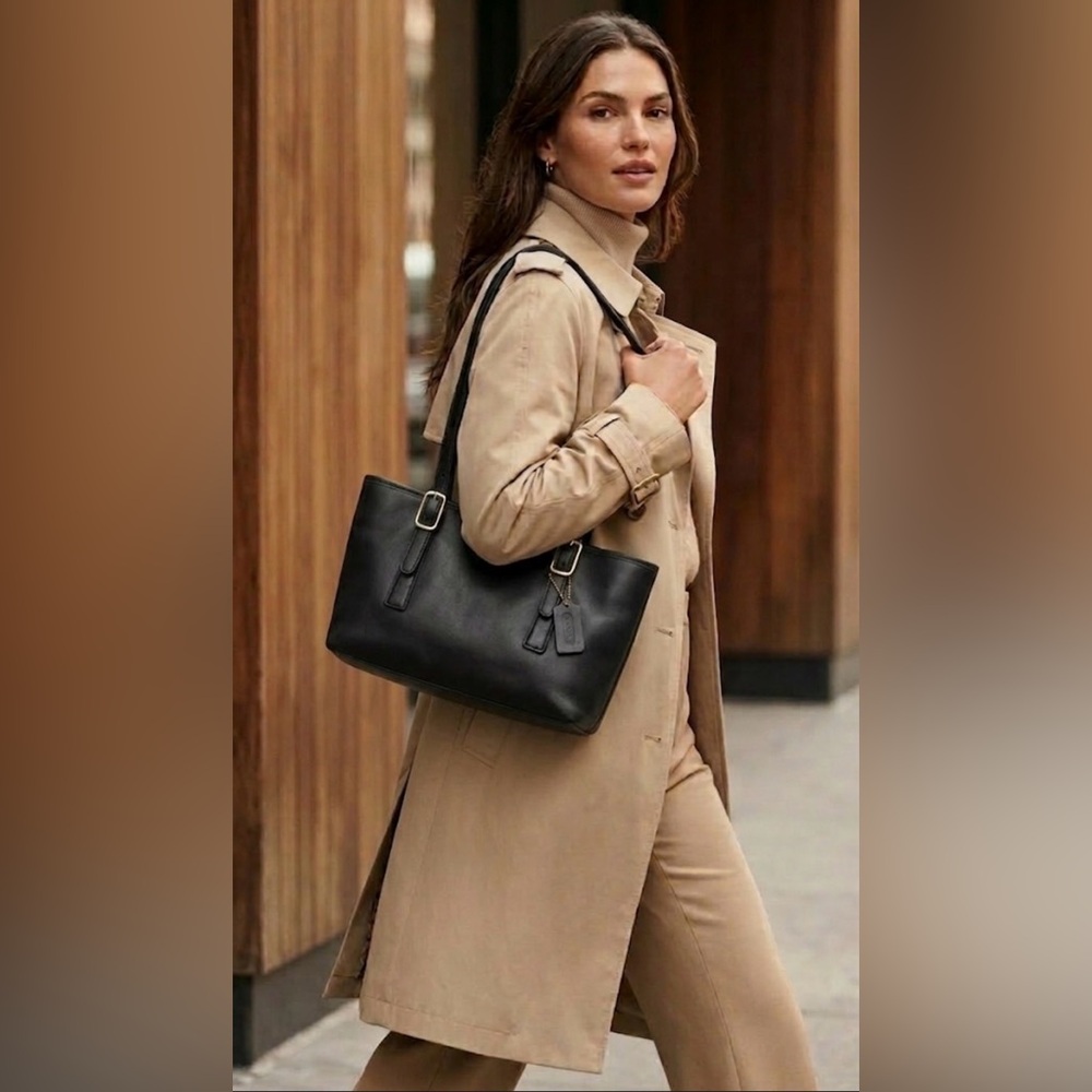 Coach Legacy Classic Shopper (model 9813) in black leather with brass hardware.
